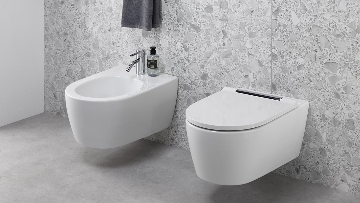 View into a bathroom with Geberit ONE WC and bidet View into a bathroom with Geberit ONE WC and bidet