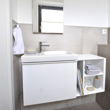 View of the guest bathroom with washbasin and cabinets View of the guest bathroom with washbasin and cabinets