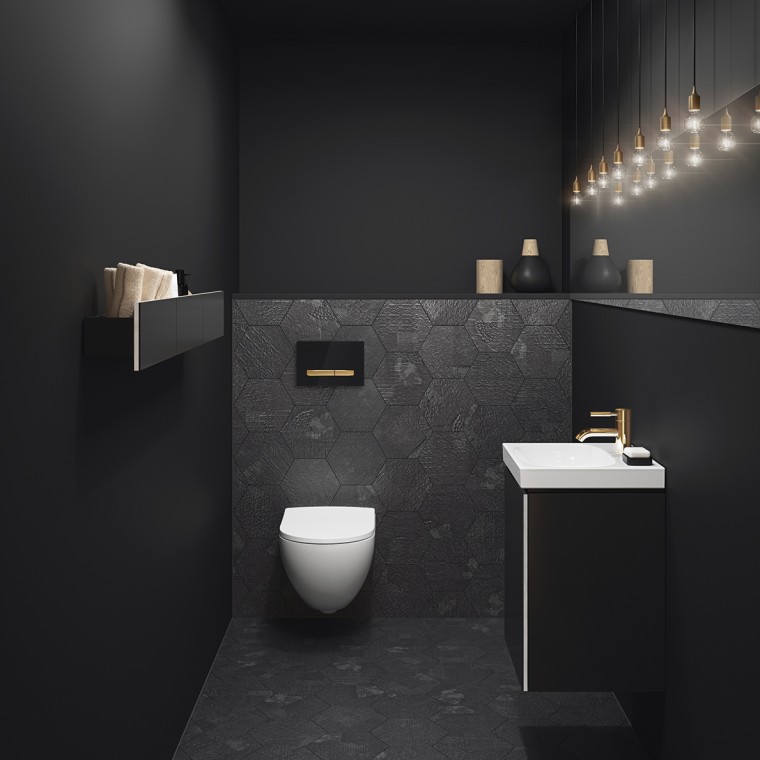 Gold taps and actuator plates combined with dark colours Gold taps and actuator plates combined with dark colours