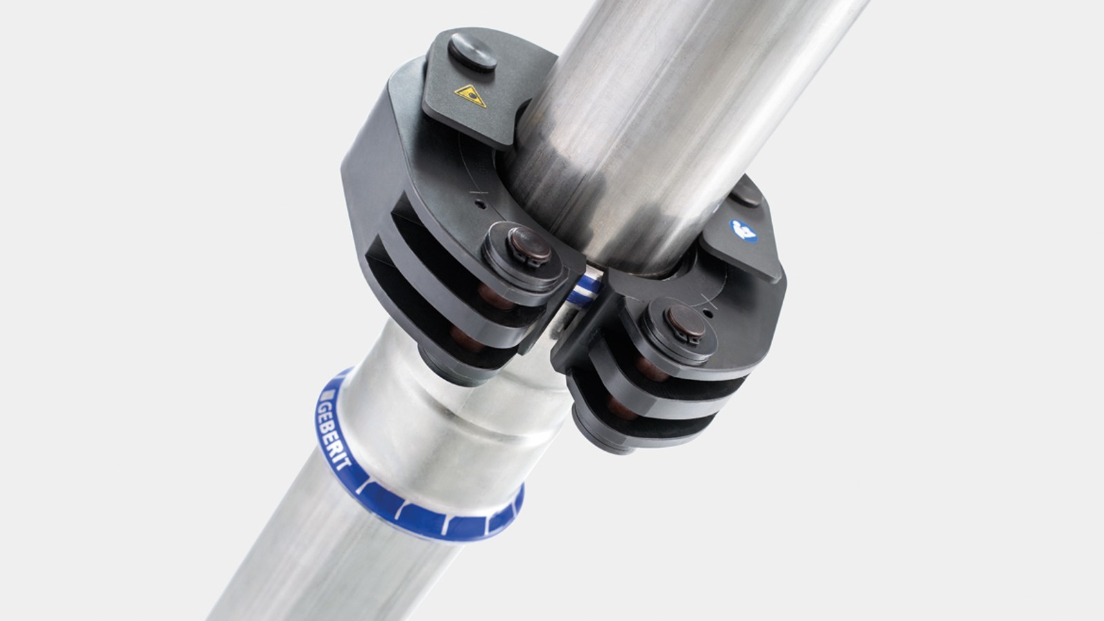 Mekanizmi i fiksimit e lidh qafën e presimit Geberit me pjesën lidhëse Geberit Mapress